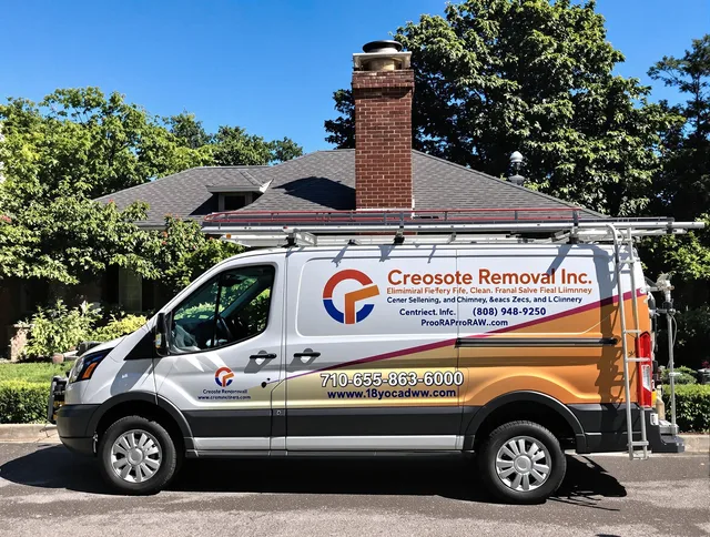 Holbrook Chimney Sweep technician removing creosote safely in Holbrook, MA