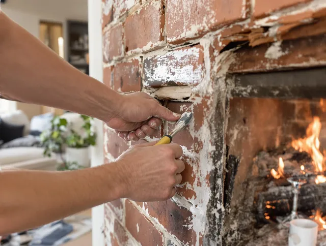Routine fireplace repair by Holbrook Chimney Sweep in Holbrook, MA